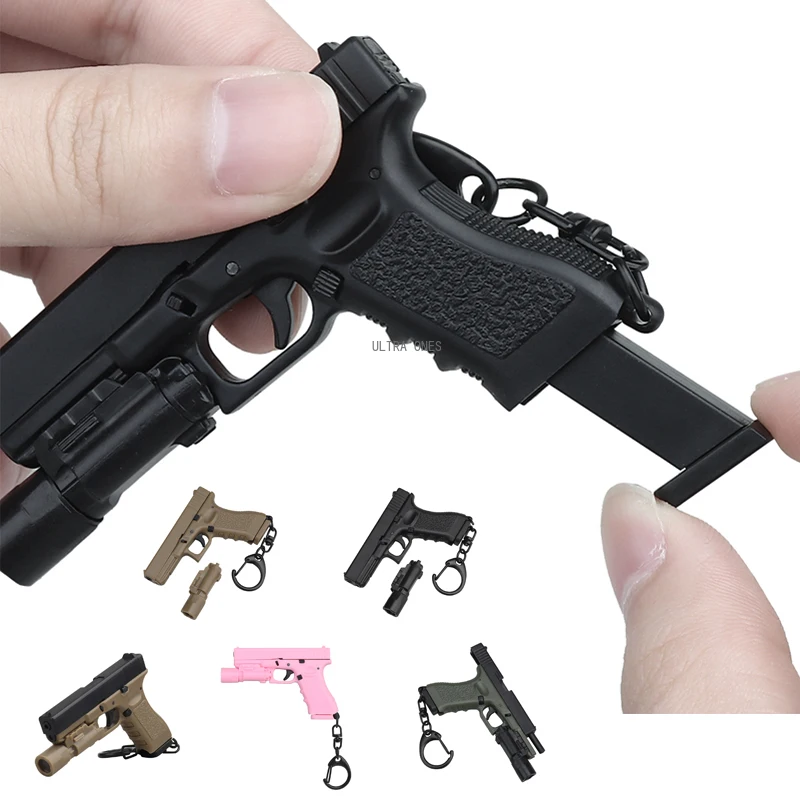 

Mini Tactical Pistol Shape Keychain G17 Model Key Ring Detachable Plastic Model Keychain Backpack Vest Decorative Prop