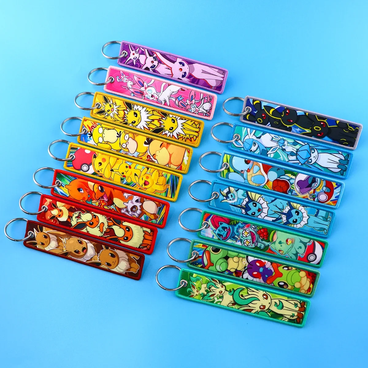 LLavero de Pokémon con marca tejida, accesorio de tejido artístico de Anime, gran oferta, en stock