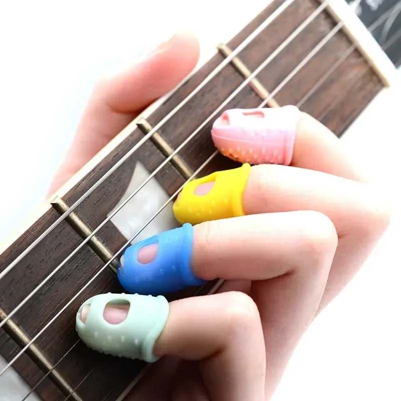 Protecteur de doigts pour cordes de guitare, 4 pièces S M L, couleur aléatoire, décrochage des doigts, pièces en Silicone, accessoires de guitare