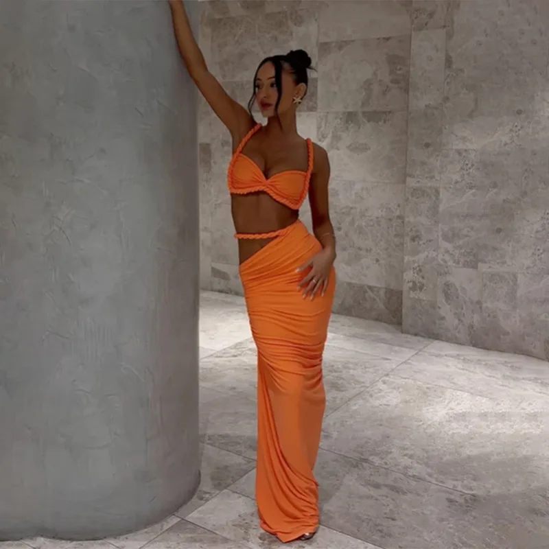 

European and American women's spring new sexy solid color backless camisole with hip-hugging skirt set