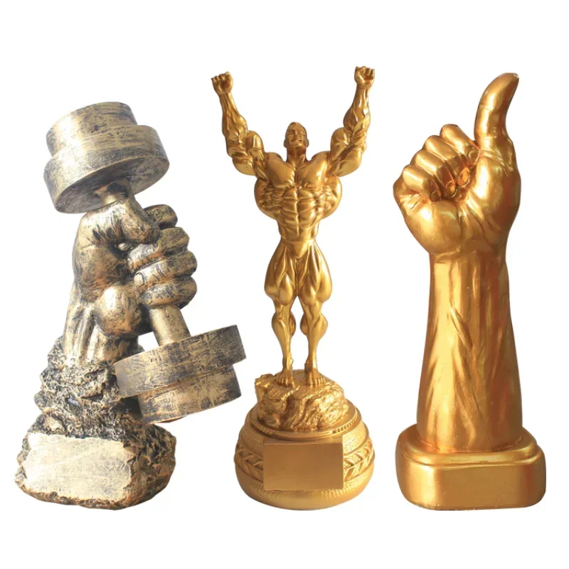 

hot Fitness muscle man sets up bodybuilding sports competition trophies, boxing figures, statues, sculptures, gym decorations