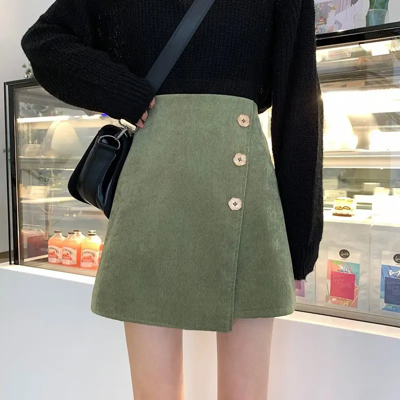 Herbst und Winter Neue Blütenblatt Knöpfe Unregelmäßigen Rock Cord Pit Streifen A-linie Rock Kurzen Rock frauen Innen Gürtel Sicherheit Hosen