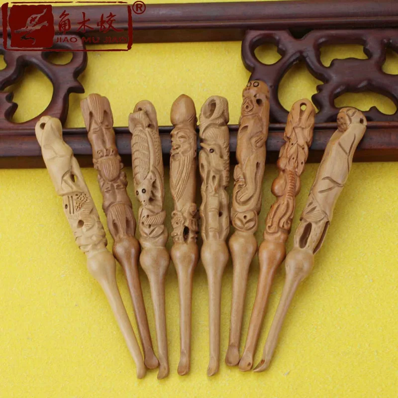 

580 Peach wood carved ear spoon Earpick Taste is a matter of face-saving