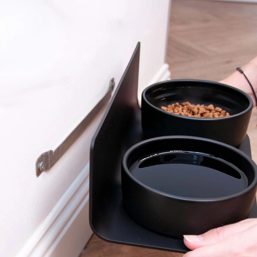 

Универсальная противоскользящая подставка для кормушки для домашних животных для автоматических диспенсеров. Эргономичная приподнятая подставка для кормушки для домашних животных с нескользящими ножками.