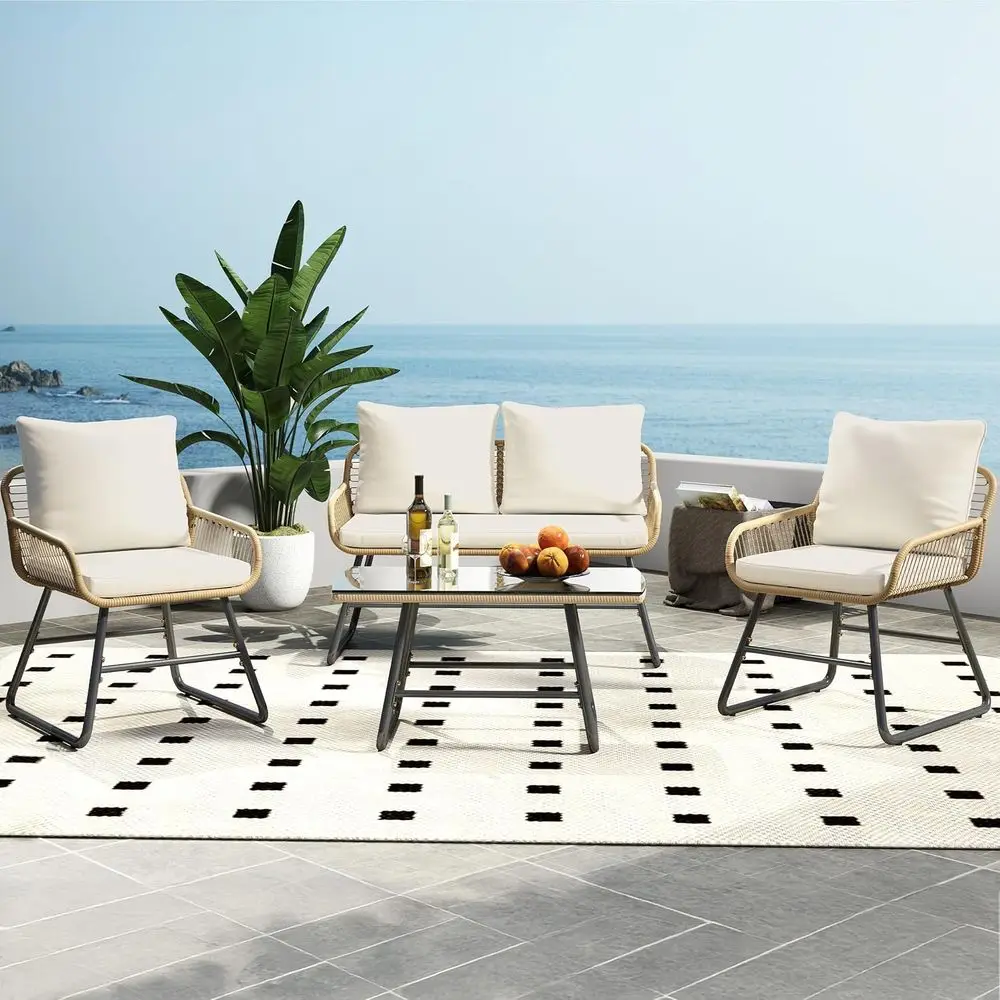 4-Piece Outdoor Wicker Patio Furniture Set with loveseat, armchairs, and glass table