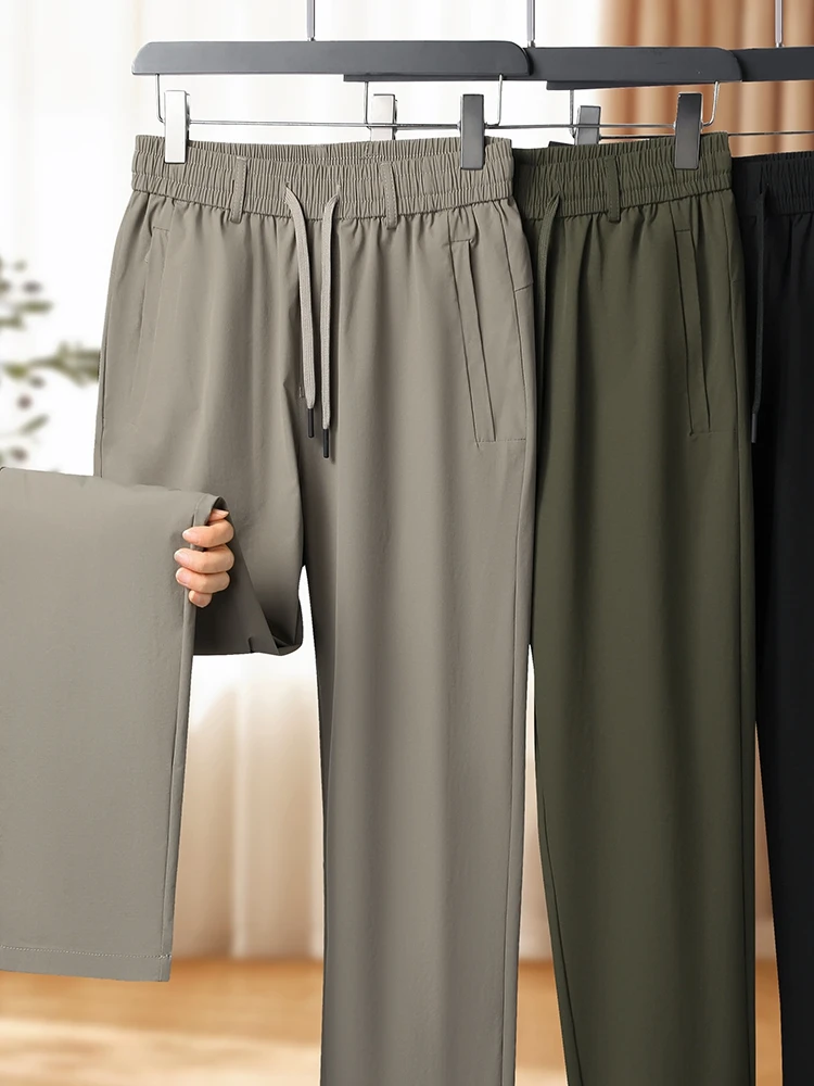 

Мужские повседневные брюки из ледяного шелка больших размеров, летние тонкие свободные эластичные спортивные брюки Qui Dry с высокой талией, прямые брюки Faion Urba...