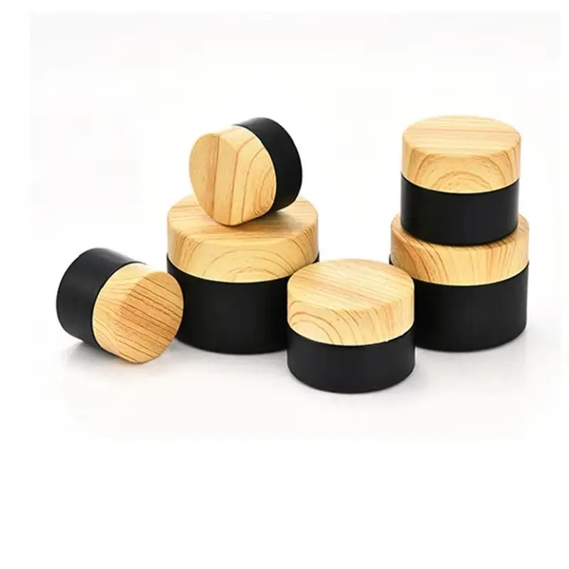 

15pcs 5g 10g 15g 20g 30g 50g Empty Matte Black Glass Cream Jar False Wood Lid Skin Care Cosmetic Refillable Face Cream Container