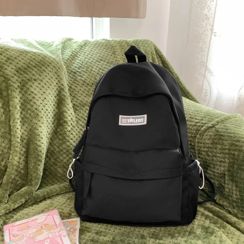 Hot Selling High-quality Solid Nylon Women's Backpack 2024 New Youth Campus Girl Backpack Cute Pendant Zipper Pocket