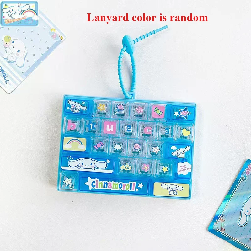 Nieuwe Sanrio 26-toetsen stressverlagende toetsenbord sleutelhangers speelgoed Kuromi My Melody vingertop druk creatief toetsenbord accessoire 26 toetsen