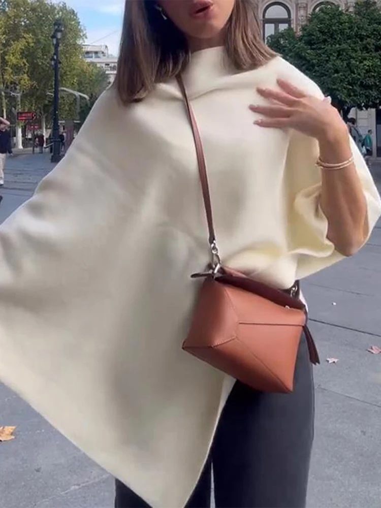 새로운 니치 디자인의 불규칙 니트 숄 여성 스웨터 루즈핏 우아한 케이프 미니멀리스트 스웨터 여성 상의 케이프