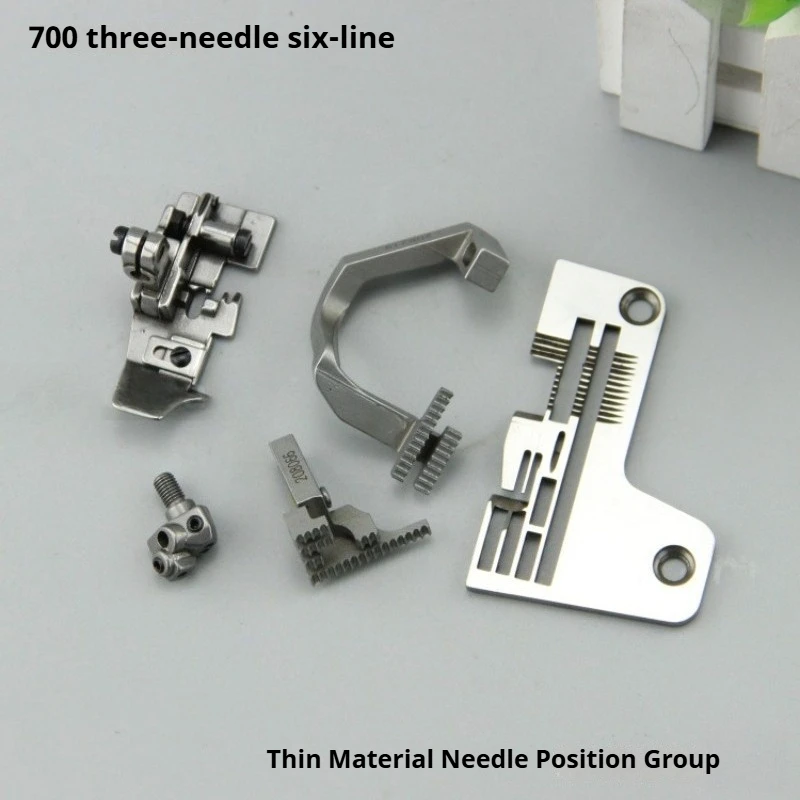 

Детали оверлока 700 3N6T: блок NP, игольная пластина, опора для собак и прижимная лапка для легких тканей