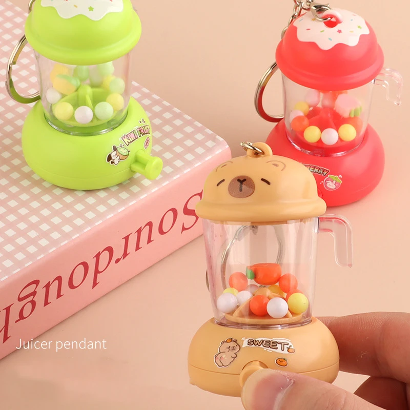 Dessin animé amusant presse-agrumes porte-clés pendentif Mini presse-agrumes breloques enfants jouets créatif sac à dos breloques accessoires presse rotatif presse-agrumes jouet