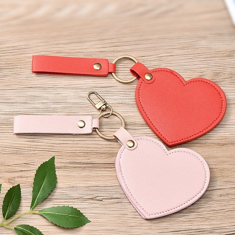 

1pc PU Leather Makeup Mirror Heart Ultra-Thin Lightweight Cosmetic Mirrors Portable Mini Rotate Travel Pocket Mirror Beauty Tool