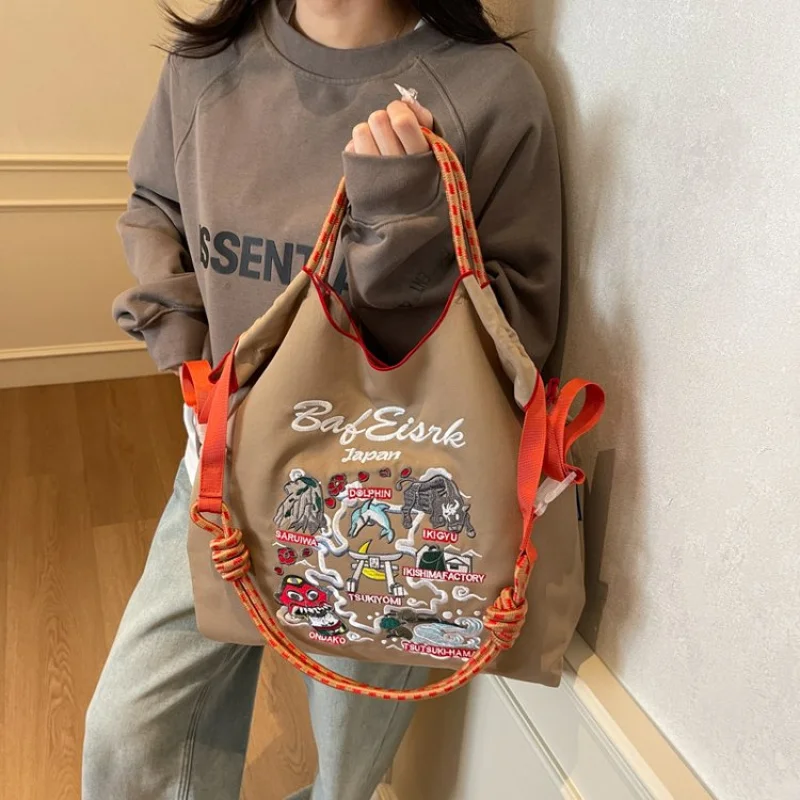 Sac messager en cuir élégant pour dames, design durable et léger avec sangle à bandoulière, adapté aux voyages ou aux déplacements