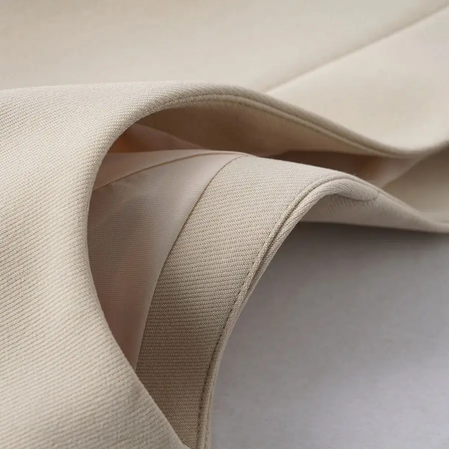 Effen kleur kort vest Dames lente- en herfstmode V-hals Diagonale knop Veelzijdige werkplek Elegant vest Jas Top