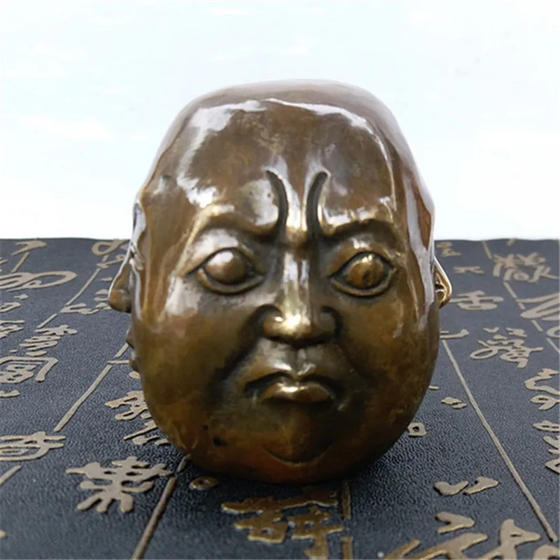 Handmade brass crafts, small four-sided head sculpture, metal figure ornament