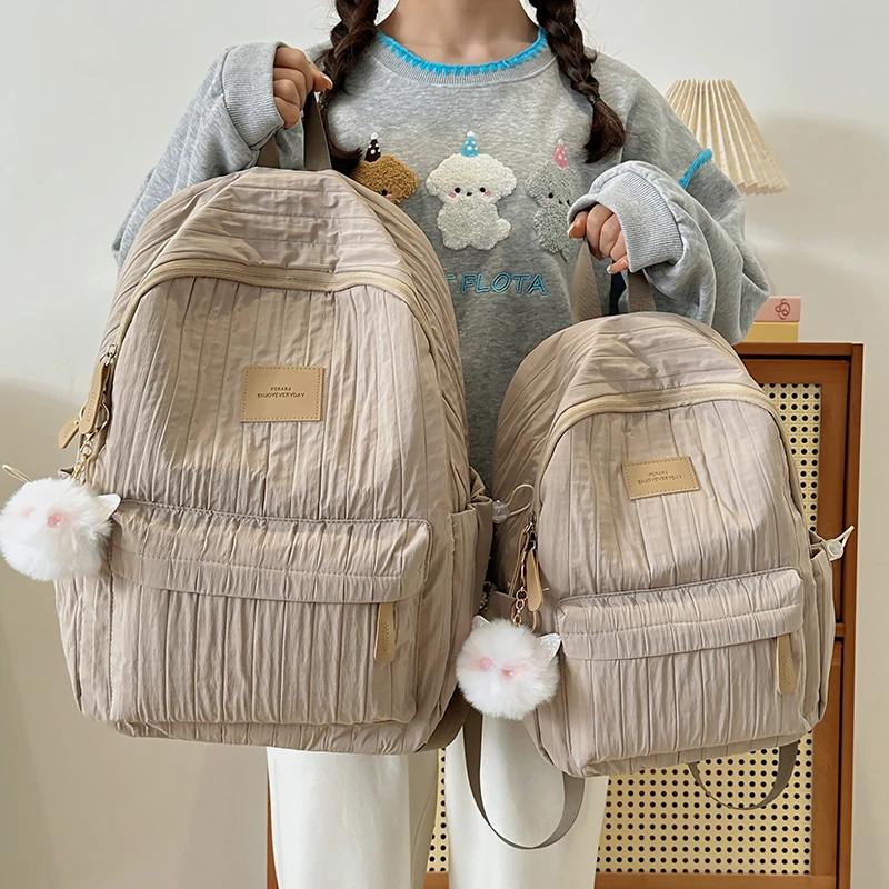 Zaini moda in filo solido in nylon Casual versatile 2025 Borse da donna di alta qualità Nuova borsa da donna di alta qualità Mochila Mujer