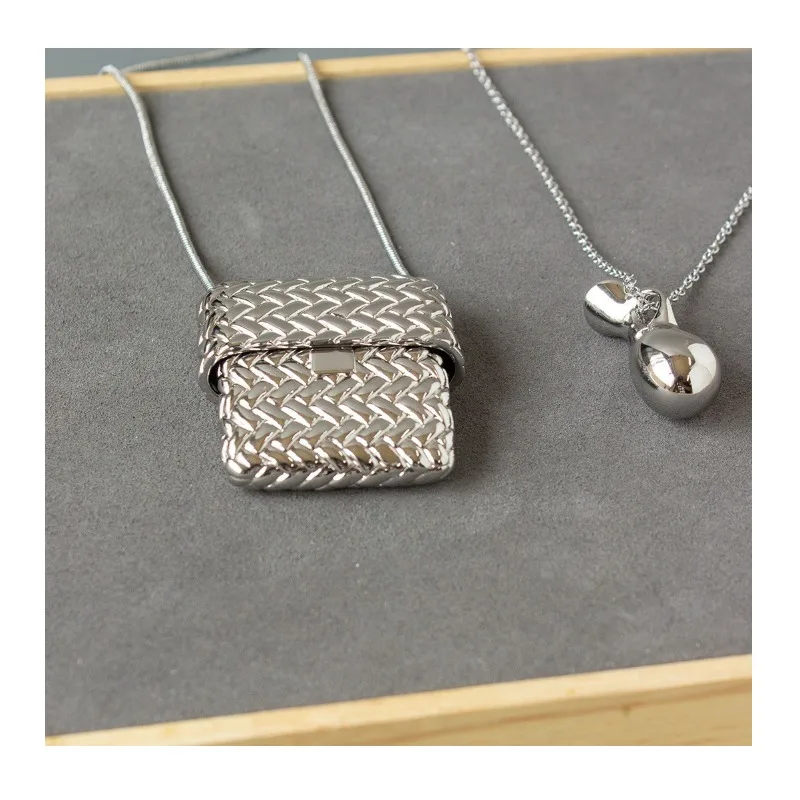 

New Korean Small Bag Water Bottle Necklace, Retro Light Luxury Long Design, High-end Woven Mini Bag Necklace