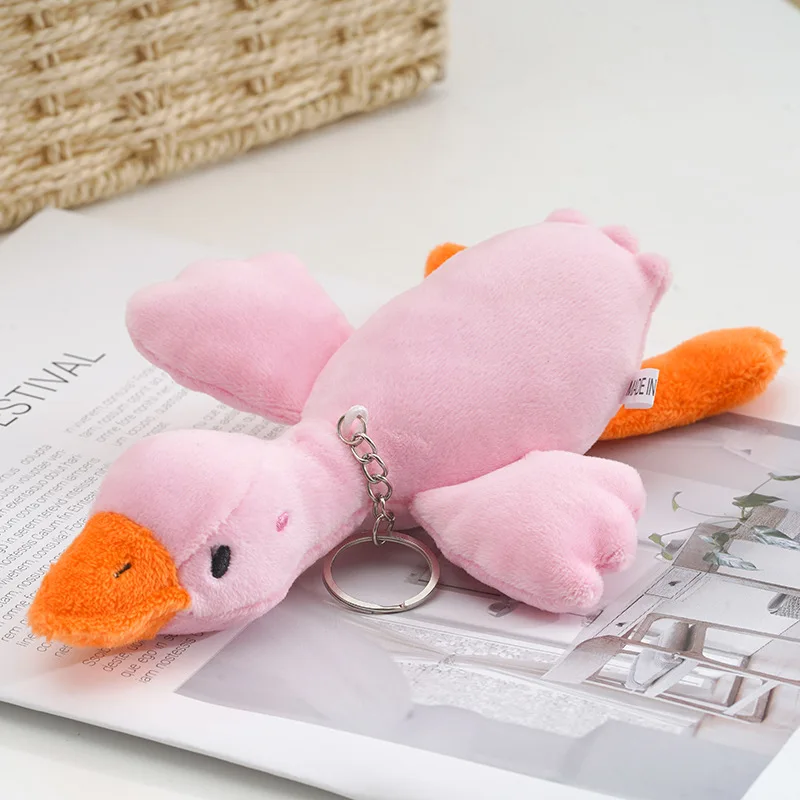 Porte-clés d'oie en peluche de dessin animé, oreiller de beurre, jouets de canard moelleux, animal mignon, 1PC