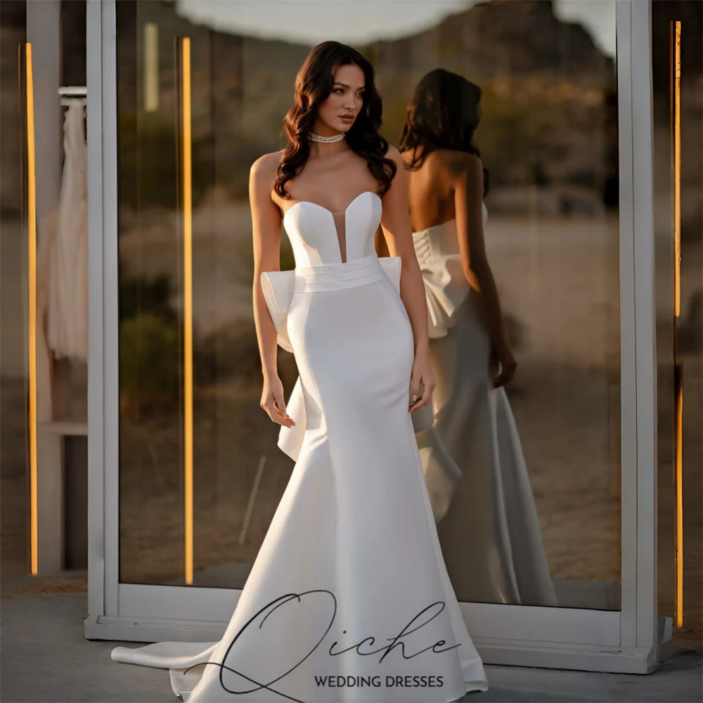 

Свадебное платье QICHE 2026: современное, атласное, с вырезом «сердечко», силуэт «русалка», без рукавов, с открытой спиной, плиссированное, на шнуровке, с шлейфом.