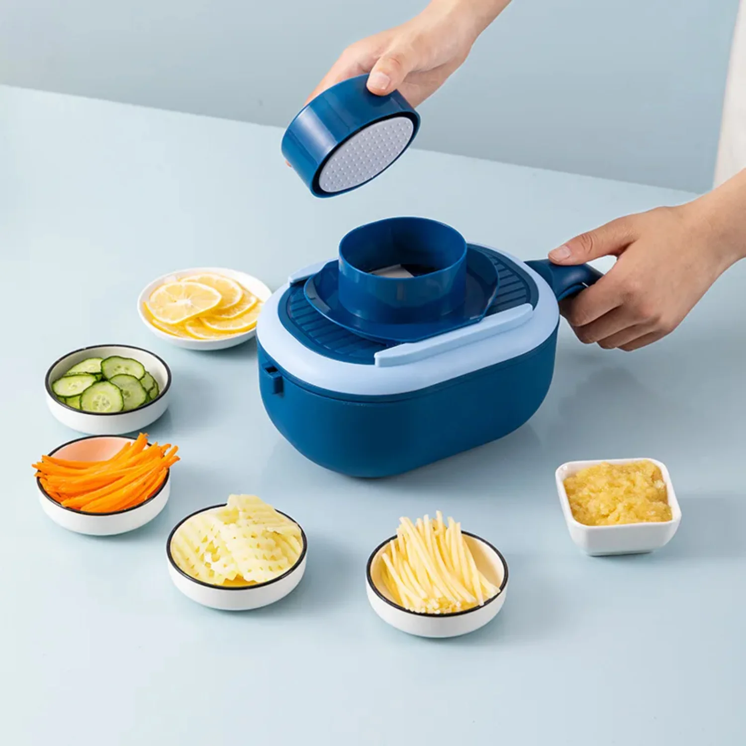 

Multifunctional Kitchen Vegetable Cutter with Slicer, Peeler, and Accessories for Potatoes, Cucumbers, Carrots, and Fruits