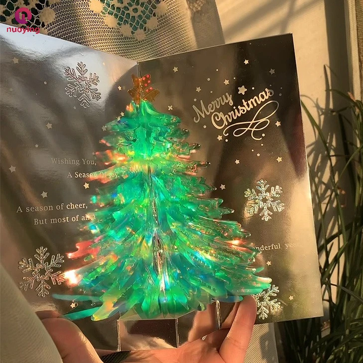 Carte de vœux de Noël festive en 3D avec effet holographique arc-en-ciel, carte cadeau à surface miroir scintillante, ornement de Noël 2026 pour la décoration intérieure.