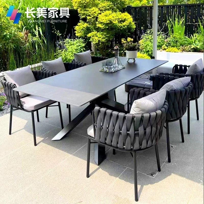 Outdoor courtyard villa garden high-end table and chairs outdoor leisure rock slab dining table rattan chairs open-air