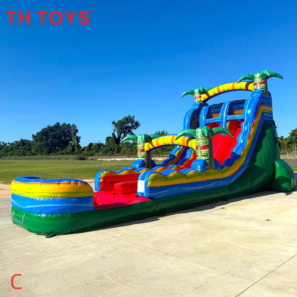 Tobogã inflável comercial gigante de dinossauro e palmeira, escorregador aquático e diversão para crianças e adultos.