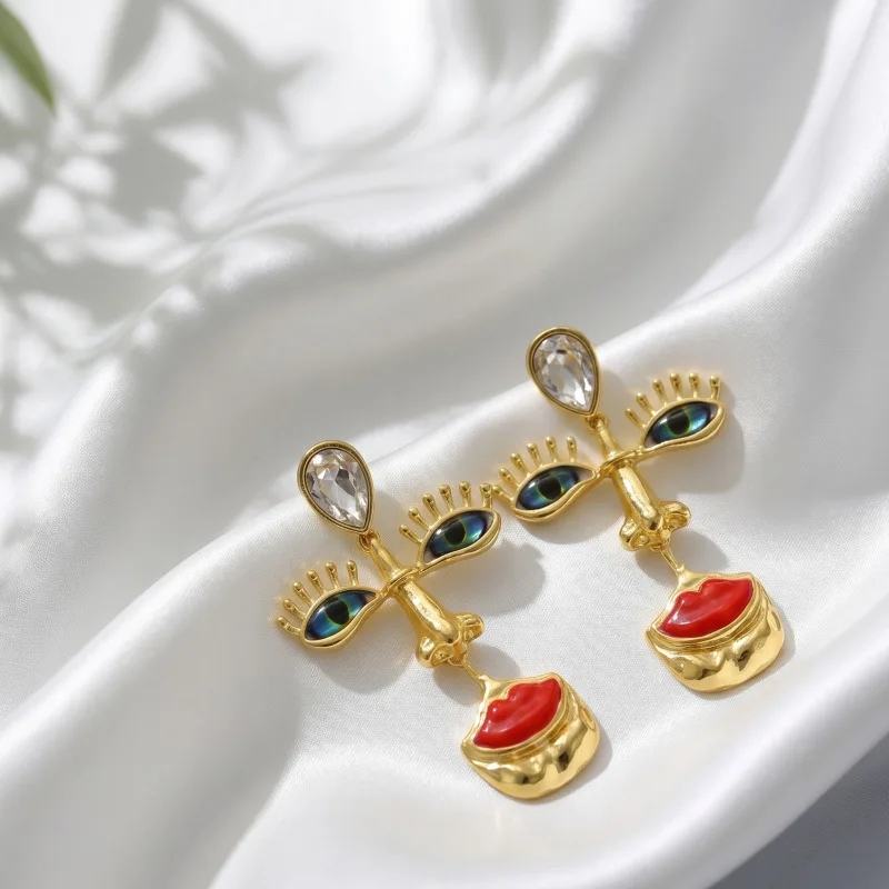 Cross-border retro abstract face eyes red lips niche exaggerated earrings personalized artistic sense light luxury earrings swee