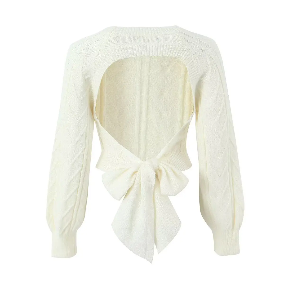 

Elegant backless knit sweater with a delicate bow. Chic, versatile, and perfect for standout style.