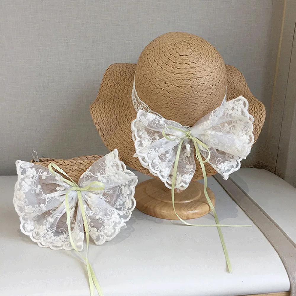 

Soft Sweet Bowknot Straw Sun Hat Ribbon Korean Style Girls Bucket Hat Breathable Lace Brim Woven Handbag