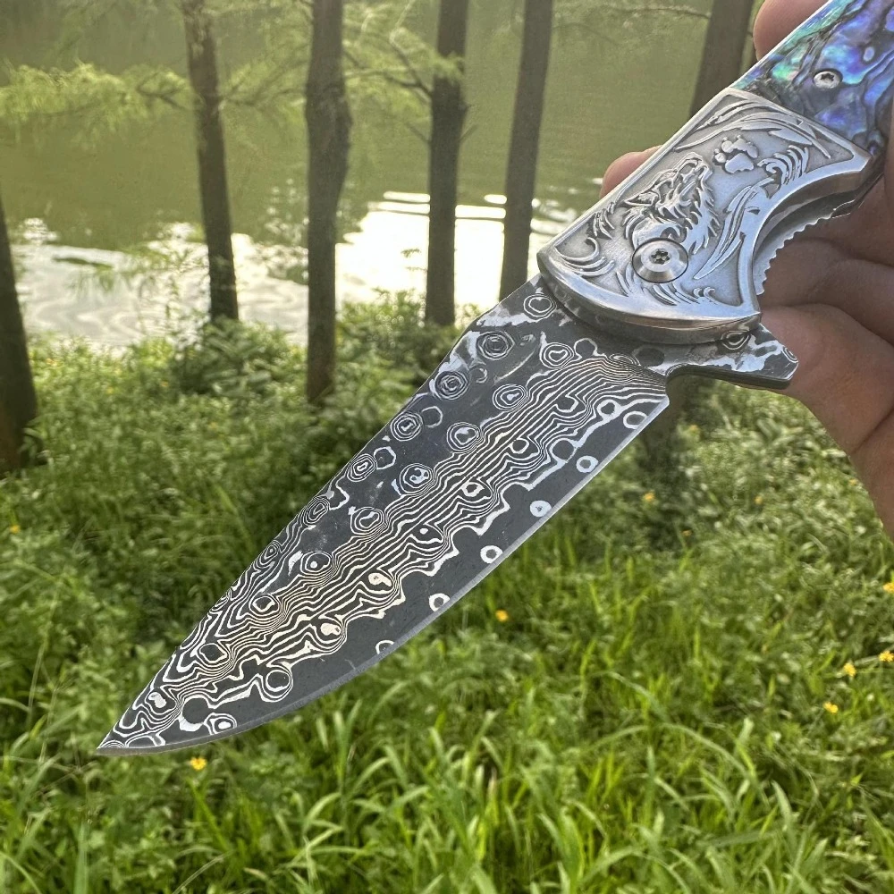 Coltello pieghevole testa di lupo Lama di Damasco conchiglia manico in ebano coltello da tasca EDC da campeggio all'aperto vendita calda transfrontaliera