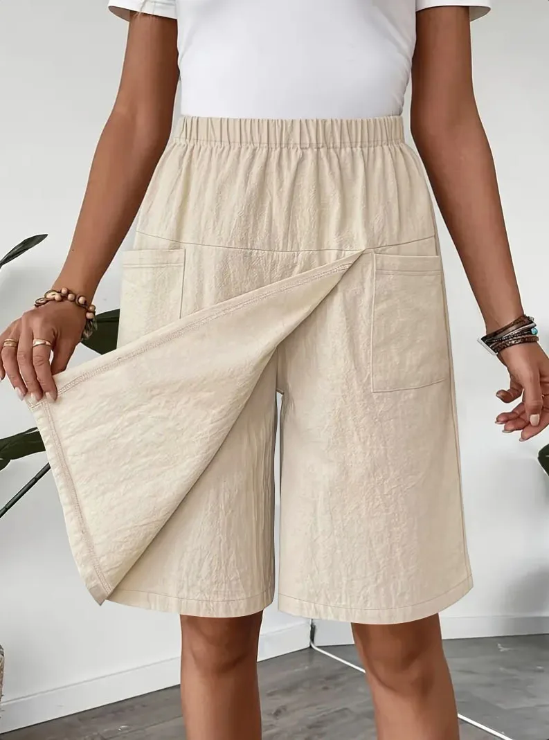 Novas calças de saia com fenda europeia e americana calças casuais para mulheres no verão casual solto cor sólida calças de cinco pontos de perna larga
