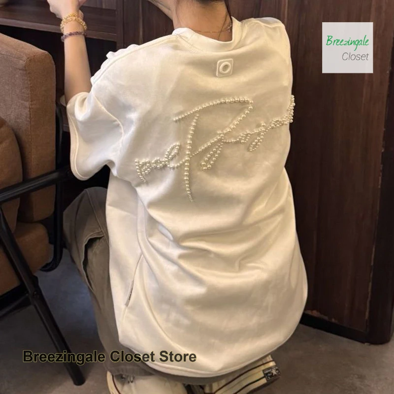 

Korean style white Pearl stereo letters cotton Joker short-sleeved T-shirt female summer new loose fashion casual Joker top.
