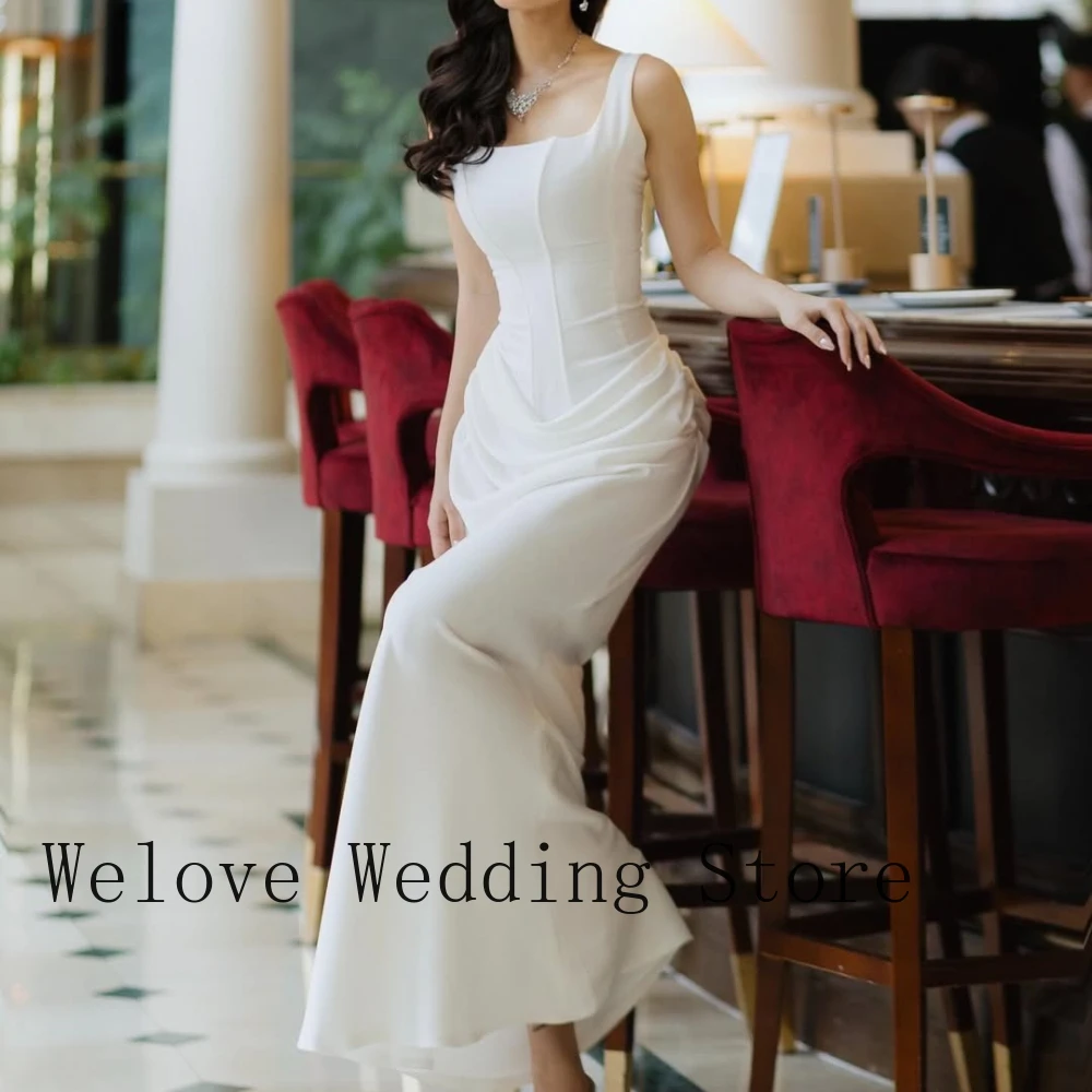 

White Formal Cocktail Dress with Square Neckline Sleeveless Design Structured Corset Bodice Ruched Draped Skirt and Midi Length