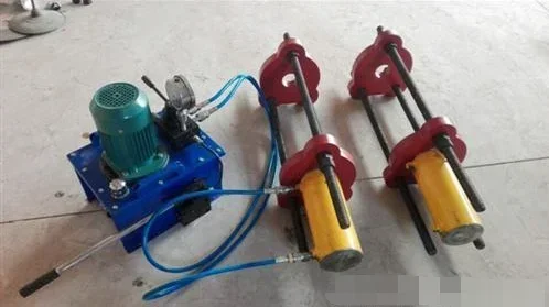 Two way hydraulic track pin disassembly and assembly machine The  pin protecting the tdismounting