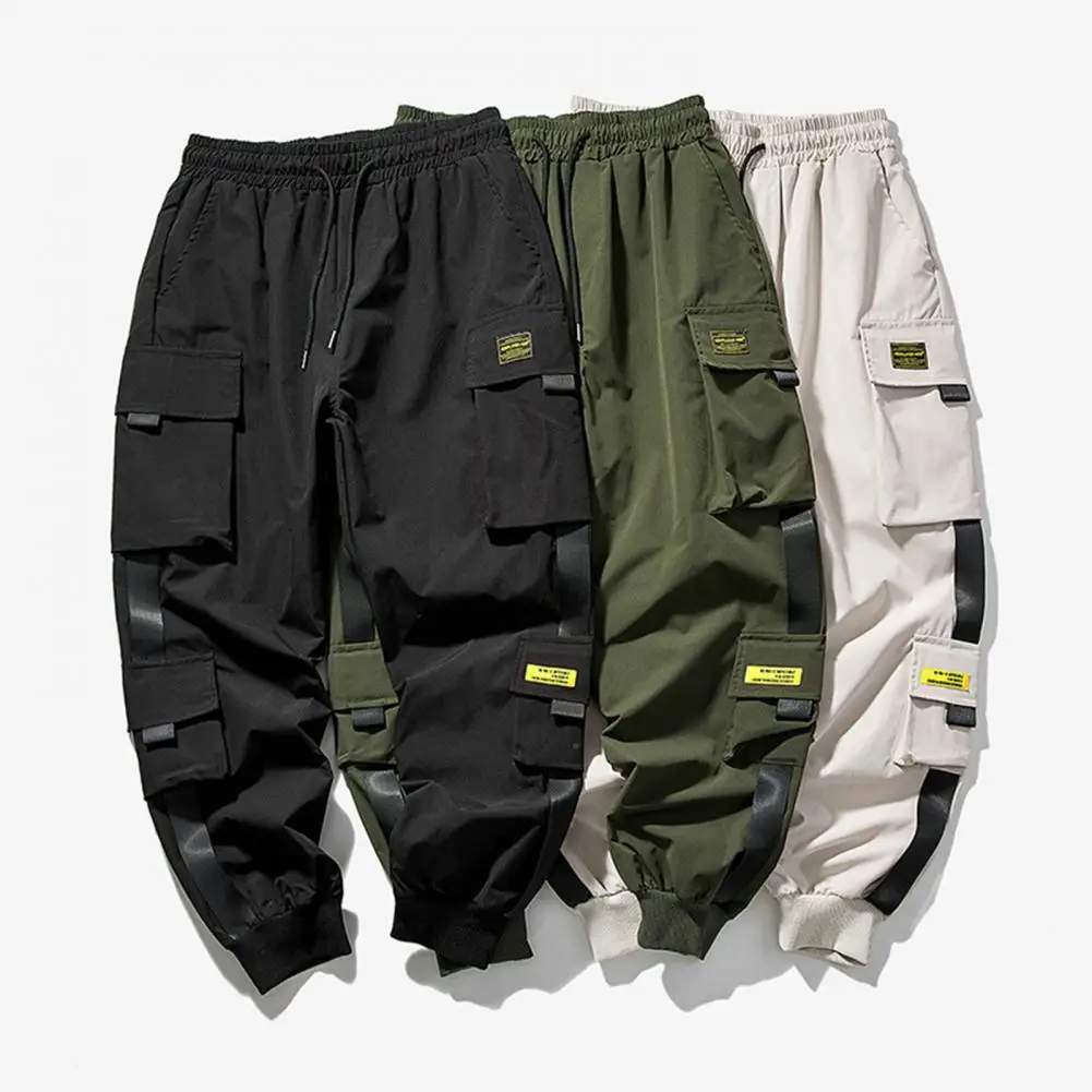 Pantalones casuales para hombres, pantalones de chándal de viaje al aire libre, correa suelta, cintura elástica, Color sólido, múltiples bolsillos