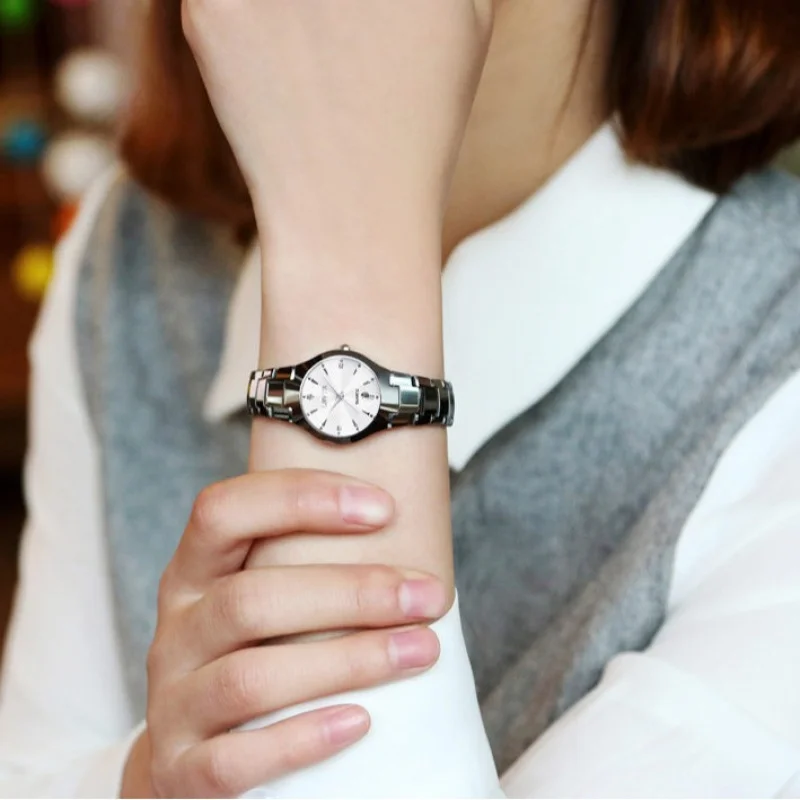 ออนไลน์ขายร้อนของแท้นาฬิกาผู้หญิงนาฬิกาผู้ชายทังสเตนเหล็กสีผู้ชายควอตซ์ปฏิทินนาฬิกาผู้หญิงคู่นักเรียน