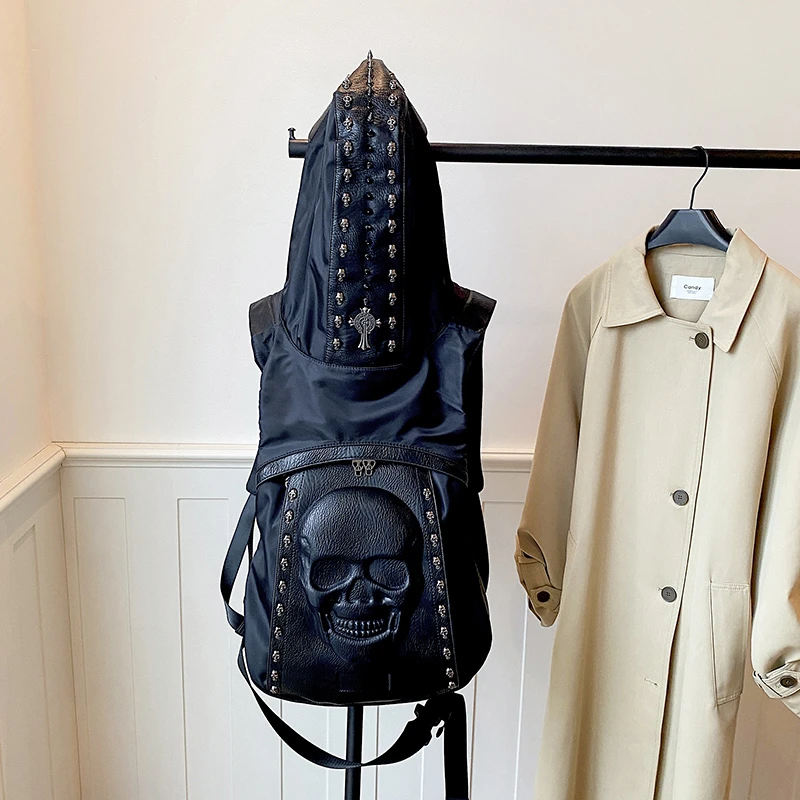 2026 New Dark Punk Gothic Hooded Backpack for Unisex 3D Skull Embossed Rivet Decor Streetwear Large Capacity Travel Backpack