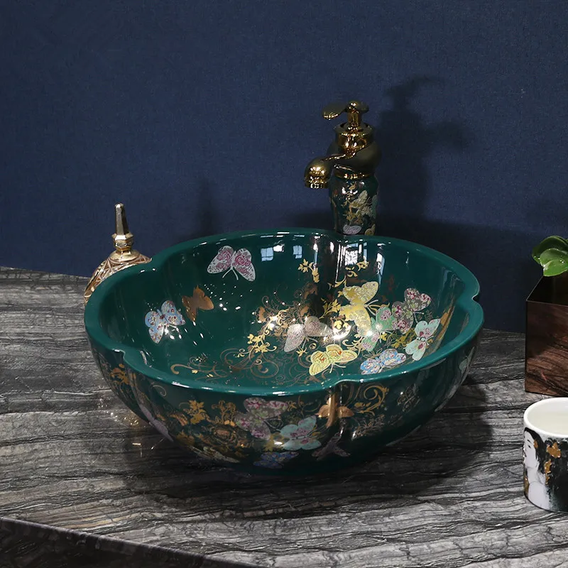 Ceramic utensils sink flower and bird pattern round bathroom counter above bathroom