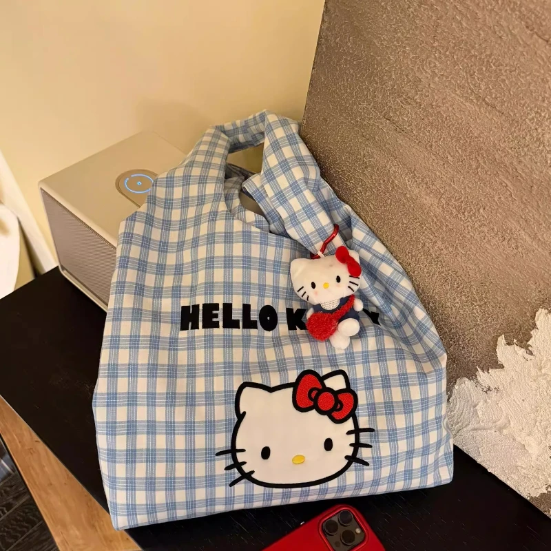 Nuevo bolso de hombro dulce a cuadros con letras bordadas para estudiantes universitarios con gran capacidad y bolso de lona versátil.