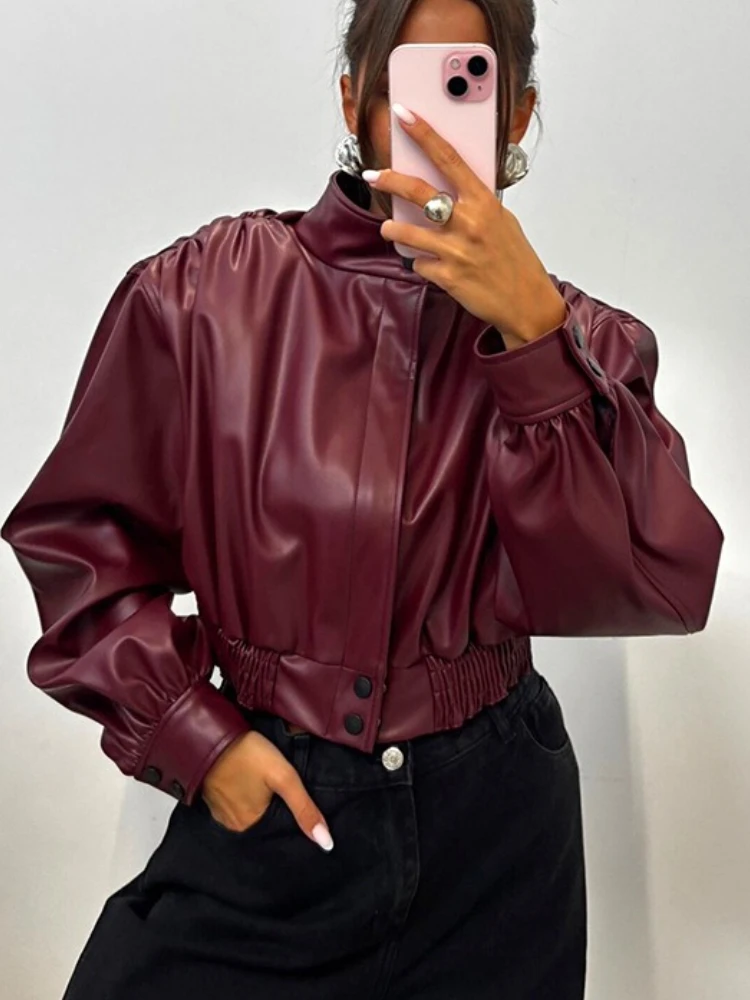 เสื้อแจ็คเก็ตหนังเทียมคอตั้งทรงสั้นสไตล์สตรีทแฟชั่น  แบบต่อผ้าสีพื้น  รุ่นใหม่สำหรับผู้หญิง
