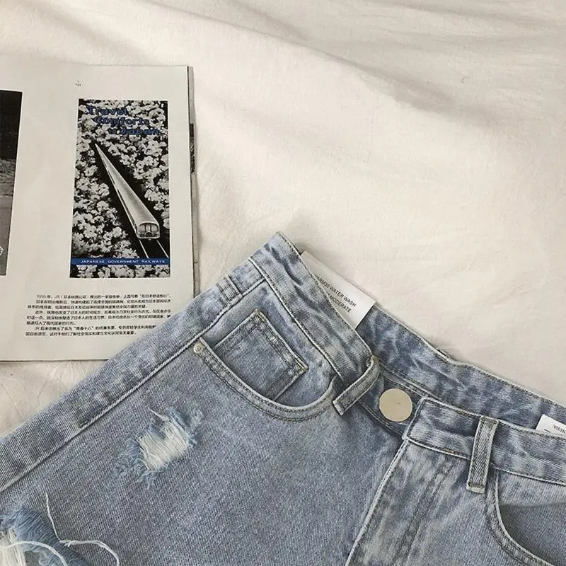 77HE 여성 하이 웨스트 와이드 레그 찢어진 데님 반바지 레트로 악세사리 닳은 원시 밑단 술 a 라인 진 짧은 바지와 포