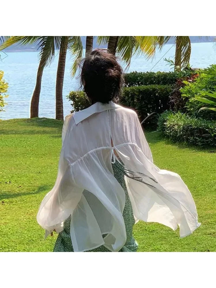 

Тонкая белая женская рубашка 2024 летняя французская Ретро дизайнерская Повседневная Солнцезащитная Свободная блузка с длинным рукавом универсальная блузка