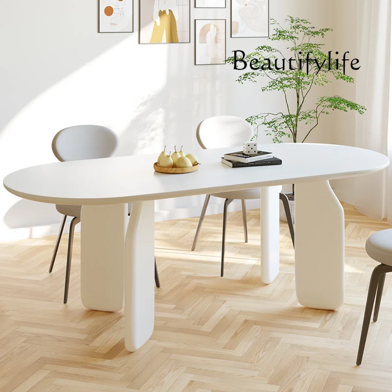 

French cream wind rock board dining table and chair combination, solid wood table foot small apartment modern simple oval