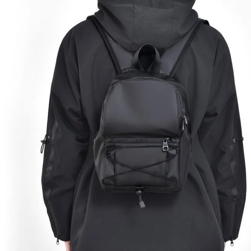 حقيبة ظهر رجالية صغيرة موضة رجل صغير الكتف المدرسية حقيبة ظهر للسفر أكسفورد القماش الذكور حقيبة الظهر 2025 في الهواء الطلق حقيبة ظهر سوداء