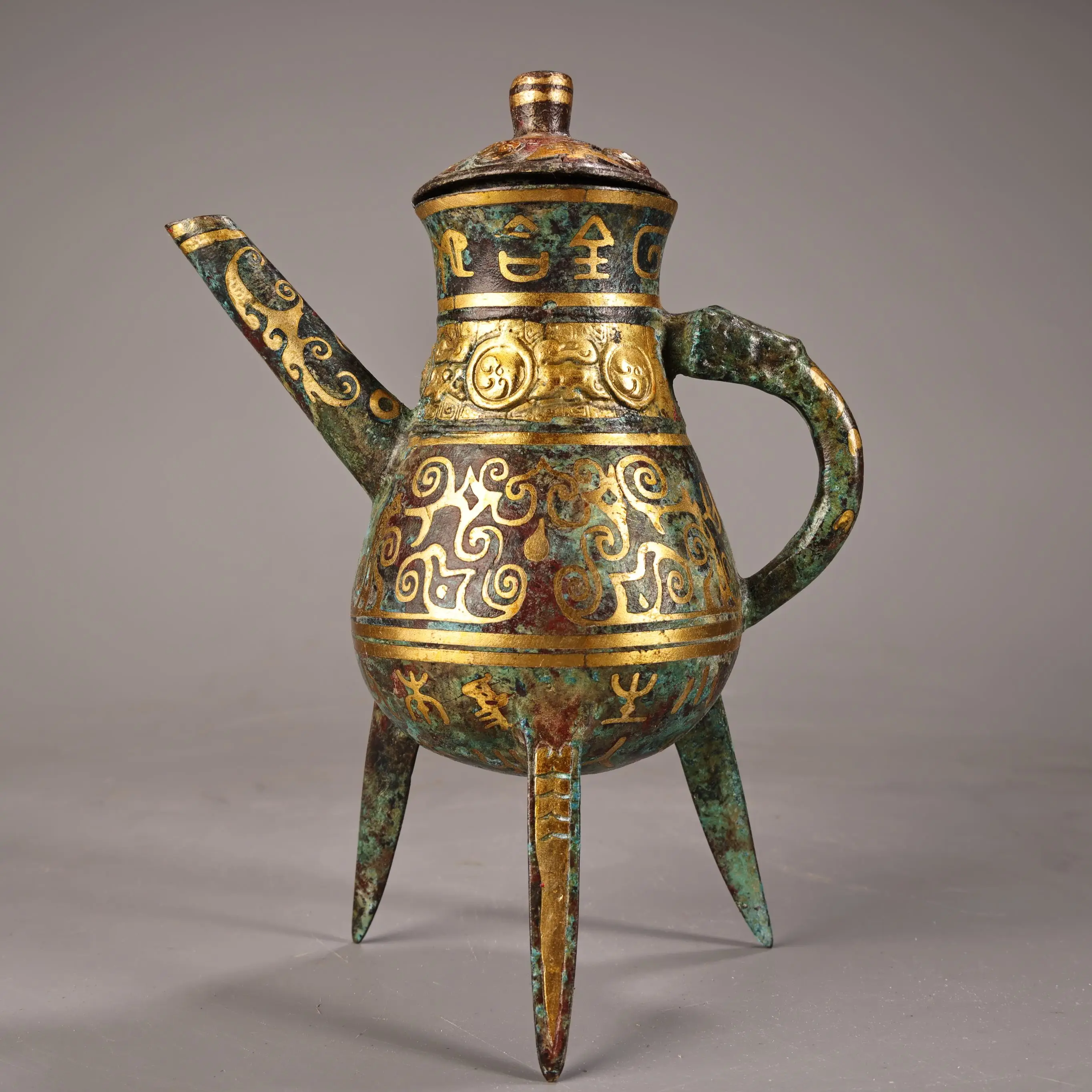 Old Nepalese folk Old Bronze Ware Gilded Inscription Oracle Bone Script Pattern Three legged Teapot Flagon Kettle Ornaments