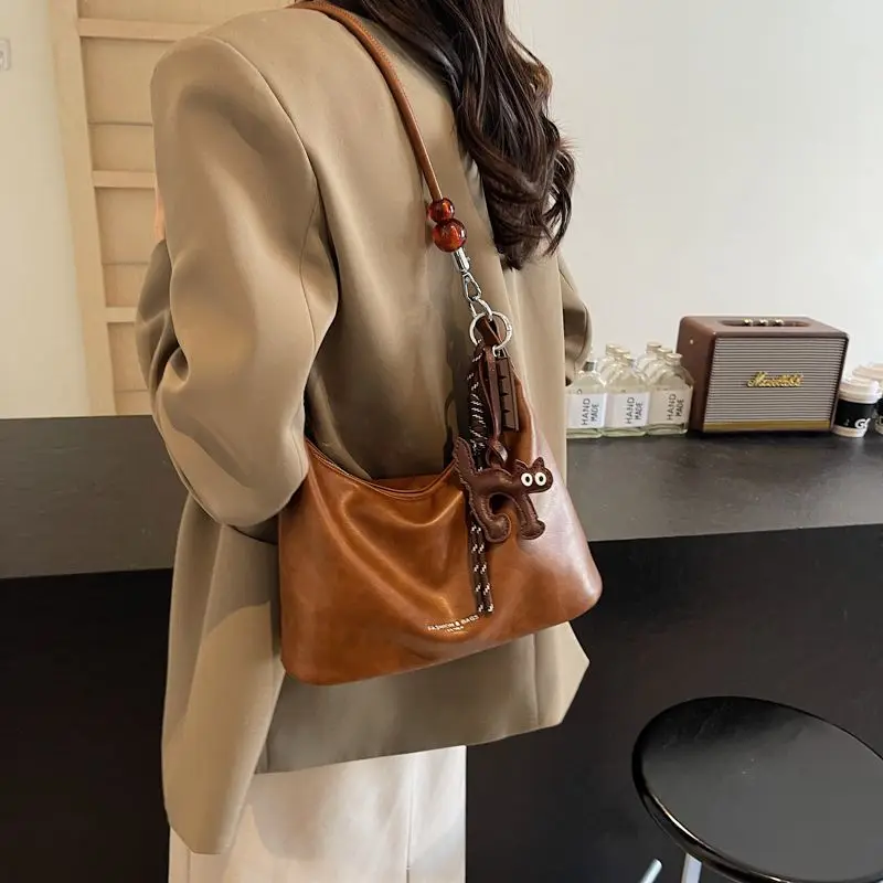 

Ретро однотонная минималистичная большая сумка женская с ручкой из бисера большая вместительная кожаная сумка через плечо женские повседневные сумки через плечо 2025