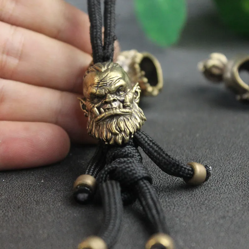 

Orcish Warrior Head Sculpture Brass Knife Bead EDC Outdoor DIY Paracord Accessories Handmade Woven Lanyard Pendant Retro Hanging