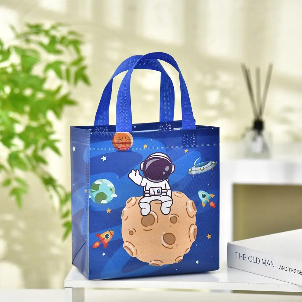 Tas tangan penyimpan mainan, kantong belanja portabel kapasitas besar, ransel penyimpanan mainan astronot motif kartun, tas tangan cetak kain tidak ditenun baru